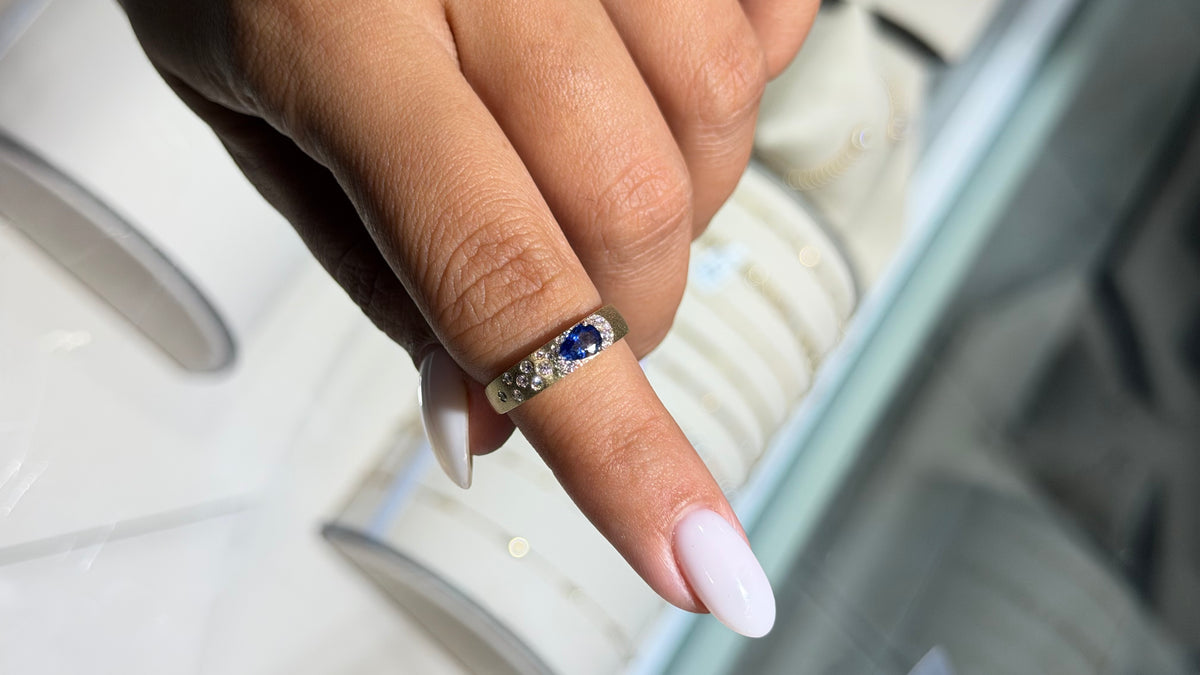 0.74ct Pear Sapphire & Scattered Diamond Band